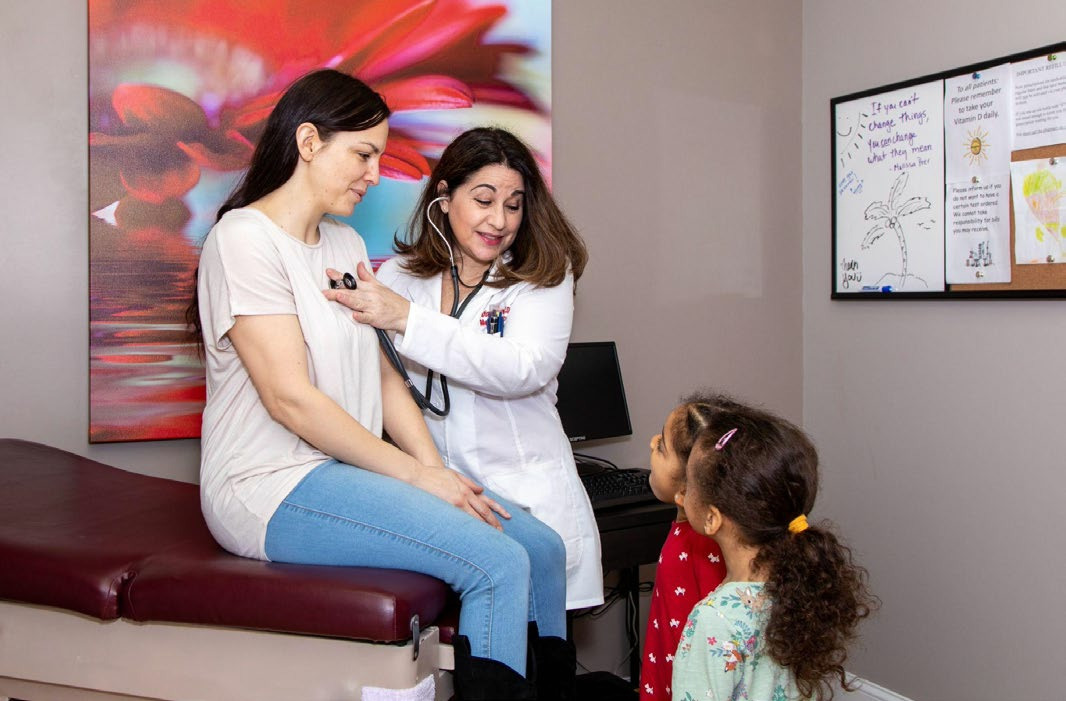 Dr. Hamawi with her patients, photo courtesy of Dr. Hamawi